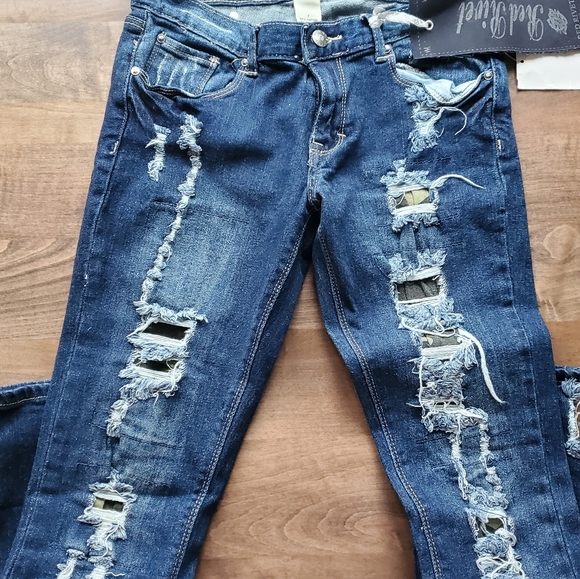 Red Rivet Jean's - Picture 1 of 4